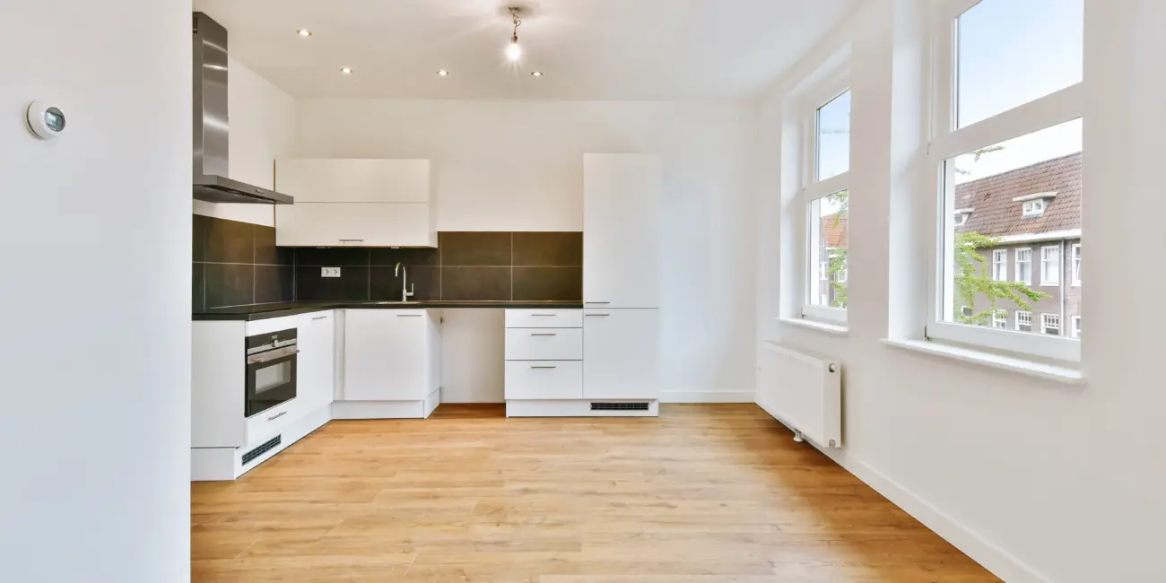 bright-kitchen-interior-with-wood-floors-and-window